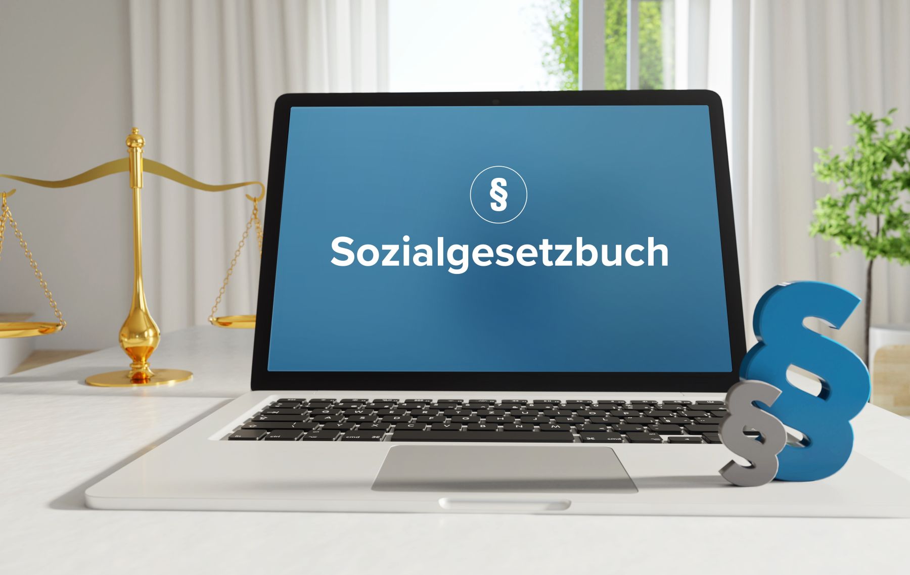 Sozialgesetzbuch – Recht, Gesetz, Internet. Laptop im Büro mi